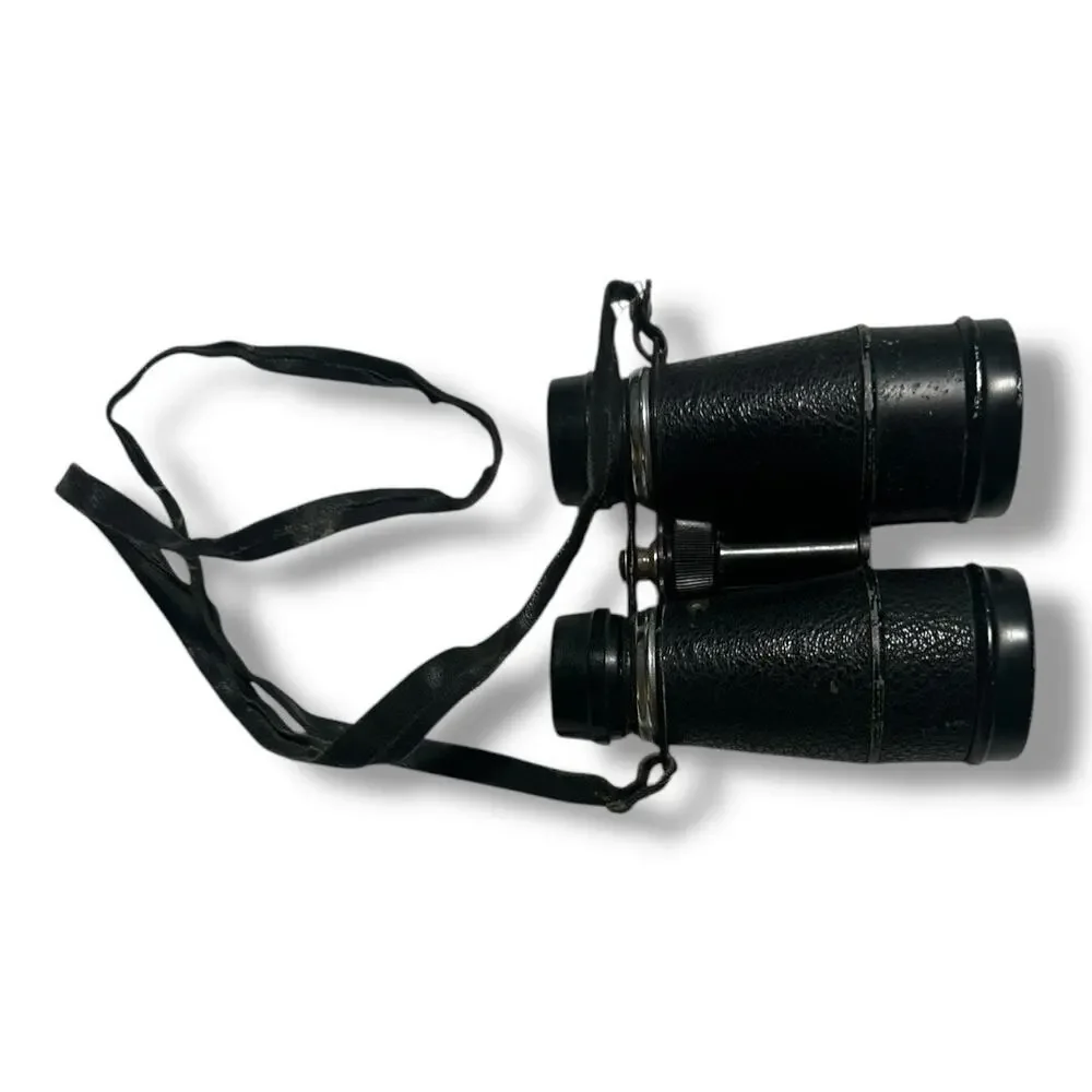 Compact Black Binoculars with Textured Grip and Central Hinge